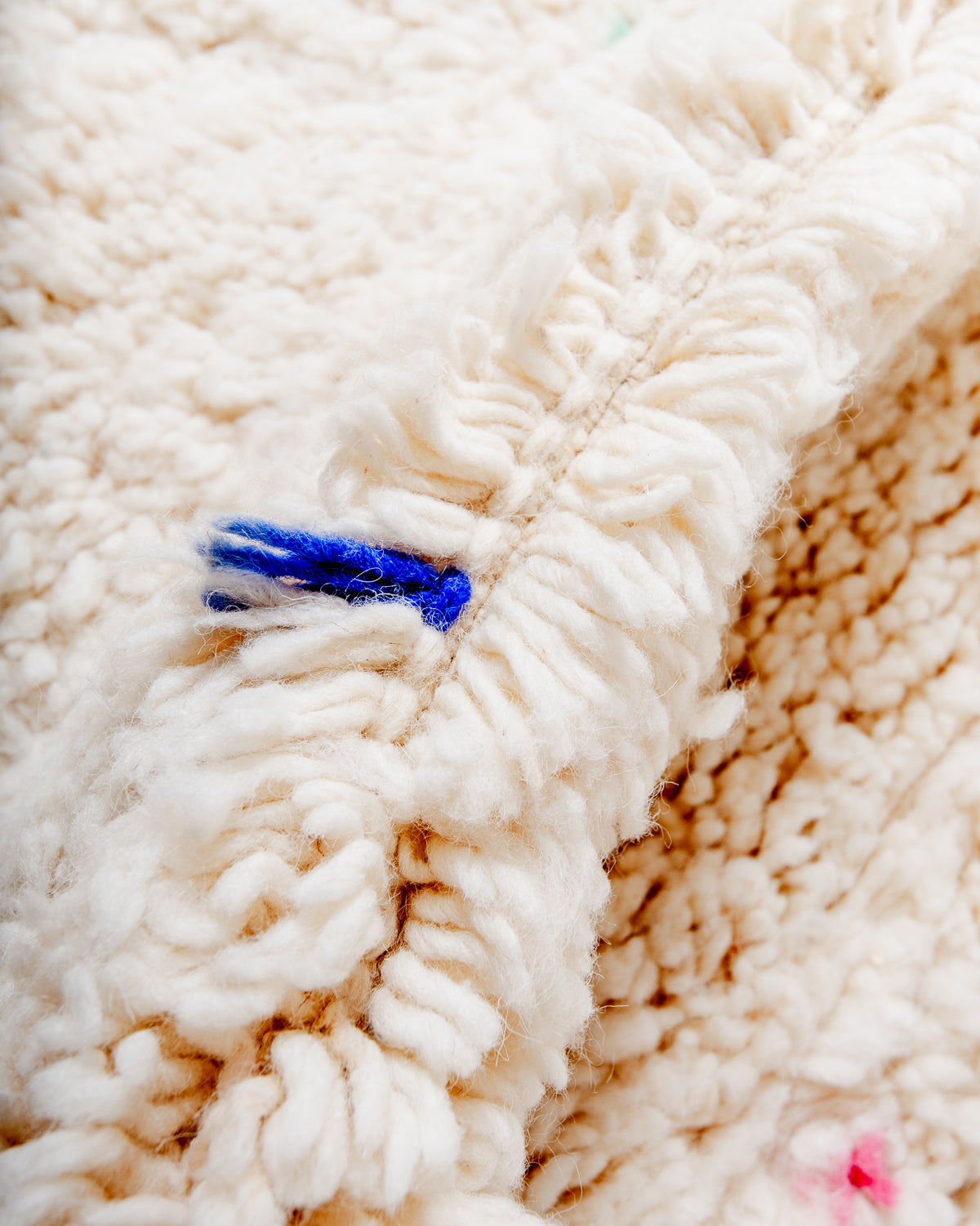 Modern, designer, handcrafted Berber rug from Morocco. Beniourain carpet with beautiful colours and patterns and fluffy wool texture.